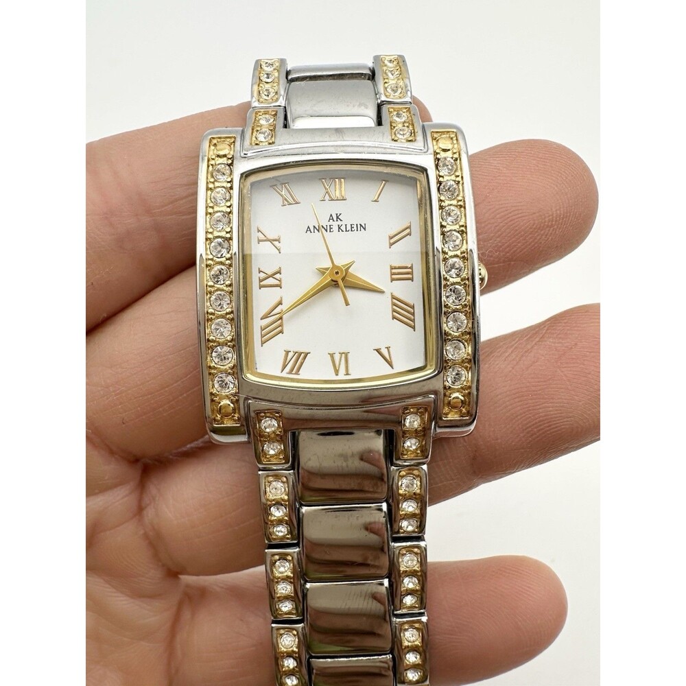 Anne Klein AK Ladies Crystal Bezel Stainless Steel Tank Style Watch Roman Dial
